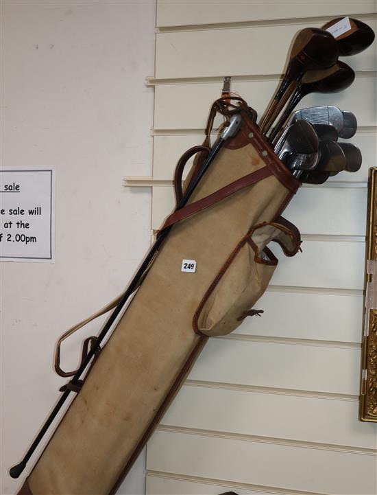 A bag of vintage golf clubs